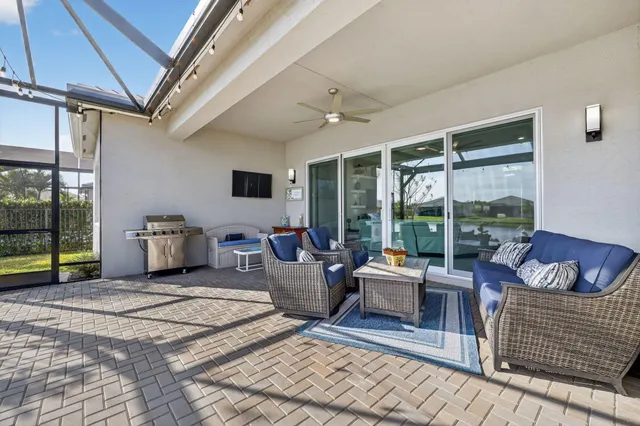a view of a room with lots of counter space and a wooden floor