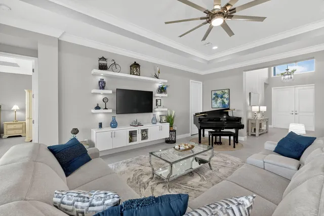 a kitchen with stainless steel appliances kitchen island granite countertop a stove top oven a sink a dining table and chairs