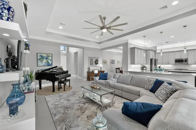 a kitchen with stainless steel appliances granite countertop a refrigerator sink and cabinets