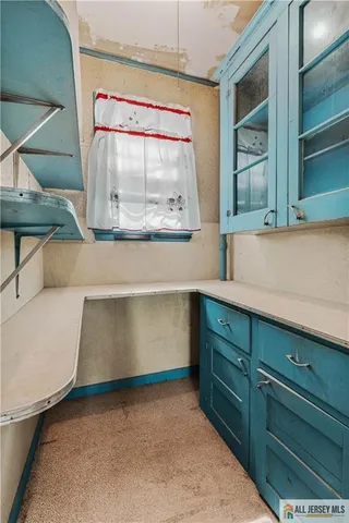 a view of a hallway with entryway