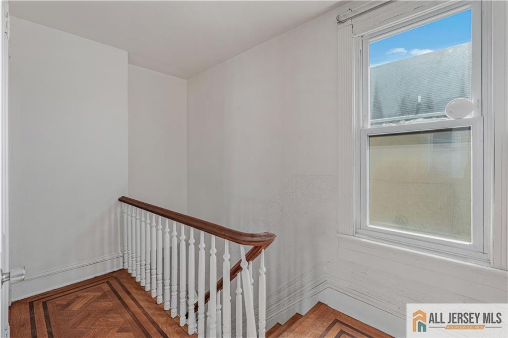 216 Handy Street New Brunswick, NJ 08901 - Photo 20 of 34 a view of a hallway with entryway
