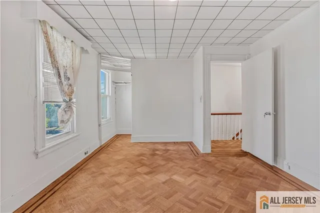 a view of empty room with windows