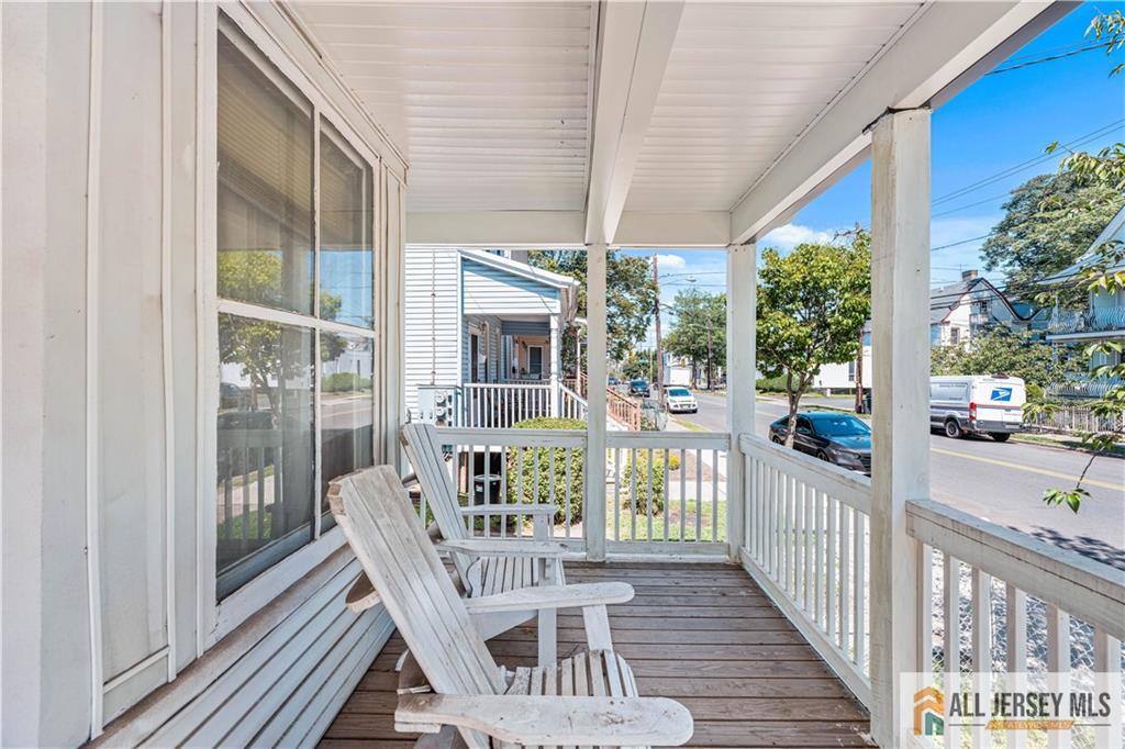 216 Handy Street New Brunswick, NJ 08901 - Photo 6 of 34 a view of a balcony with wooden floor