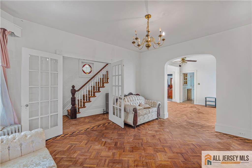 216 Handy Street New Brunswick, NJ 08901 - Photo 9 of 34 a view of a chandelier in a room