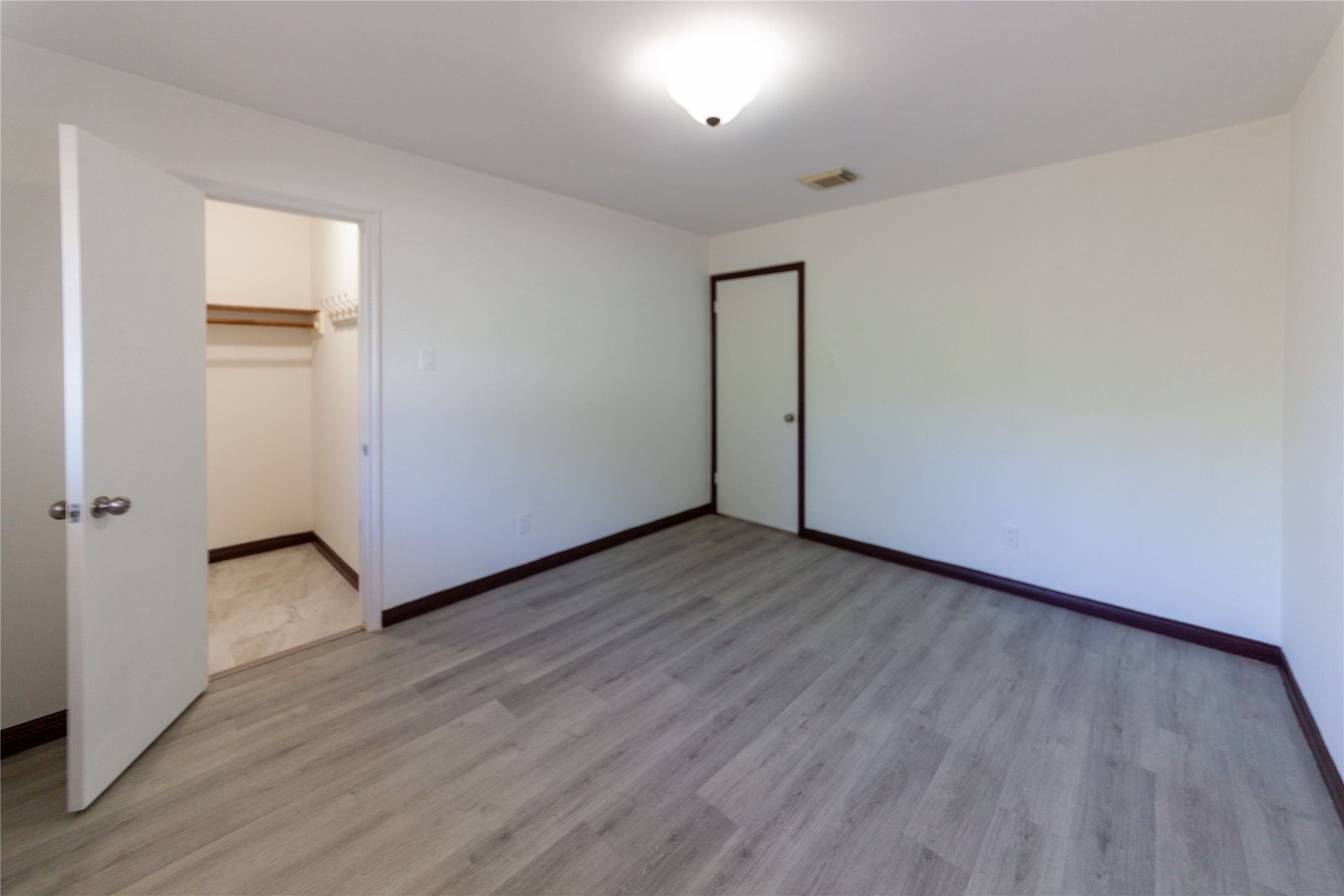 8826 Roos Road Houston, TX 77036 - Photo 32 of 42 Bedroom 3 with its own walk-in Closet