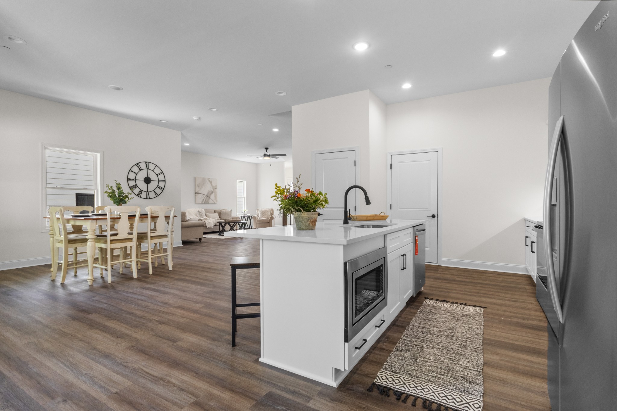 463 Centre Street Pleasant View, TN 37146 - Photo 12 of 43 a kitchen with stainless steel appliances a refrigerator and a stove top oven