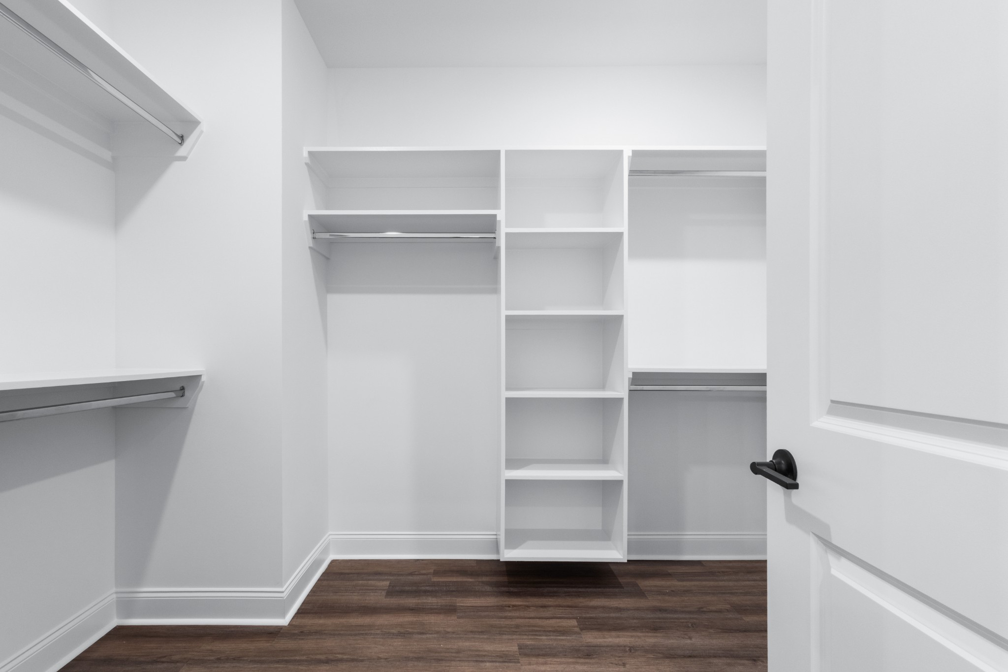 463 Centre Street Pleasant View, TN 37146 - Photo 21 of 43 a view of walk in closet with empty racks