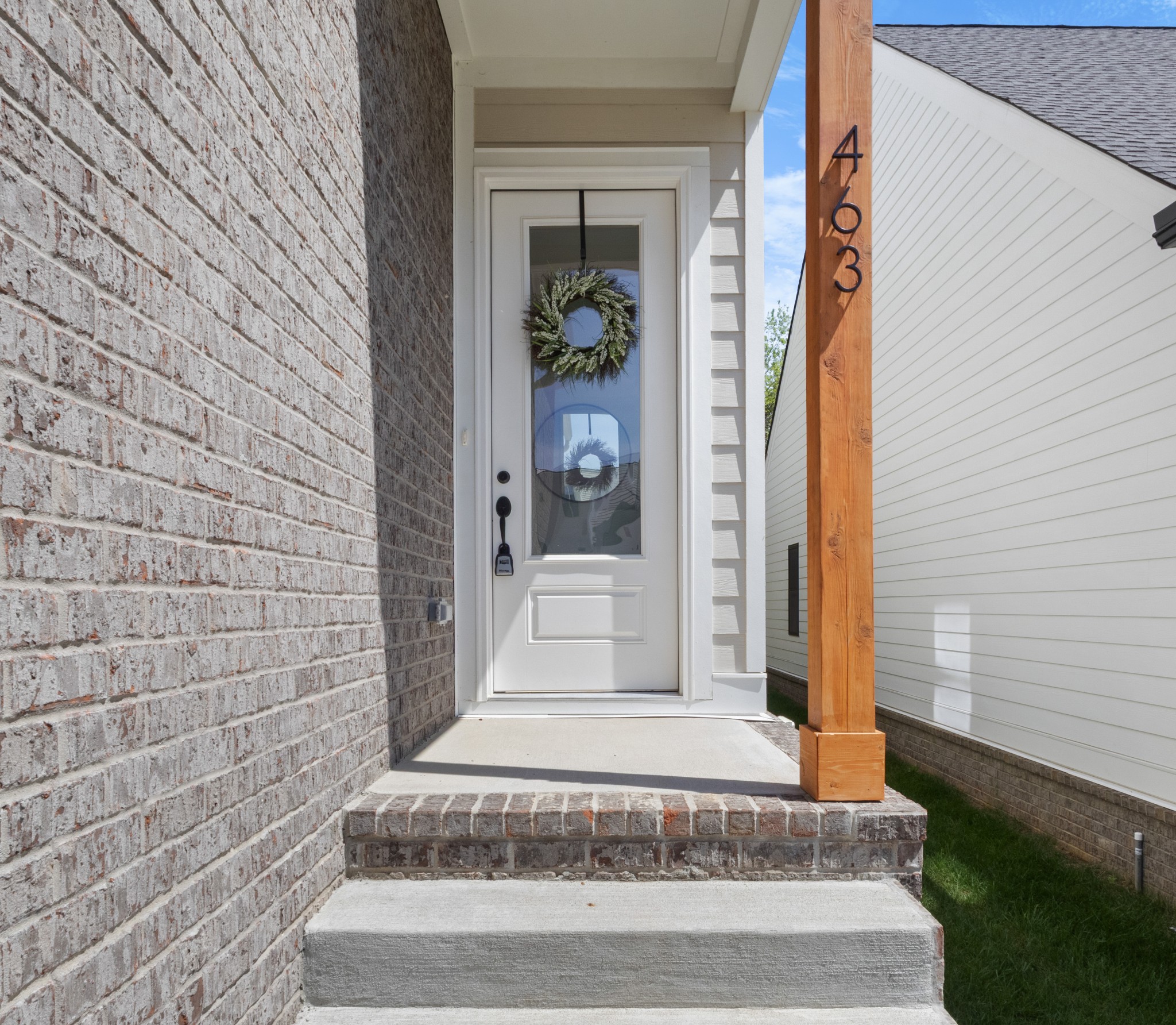 463 Centre Street Pleasant View, TN 37146 - Photo 5 of 43 a front view of a house with a white door