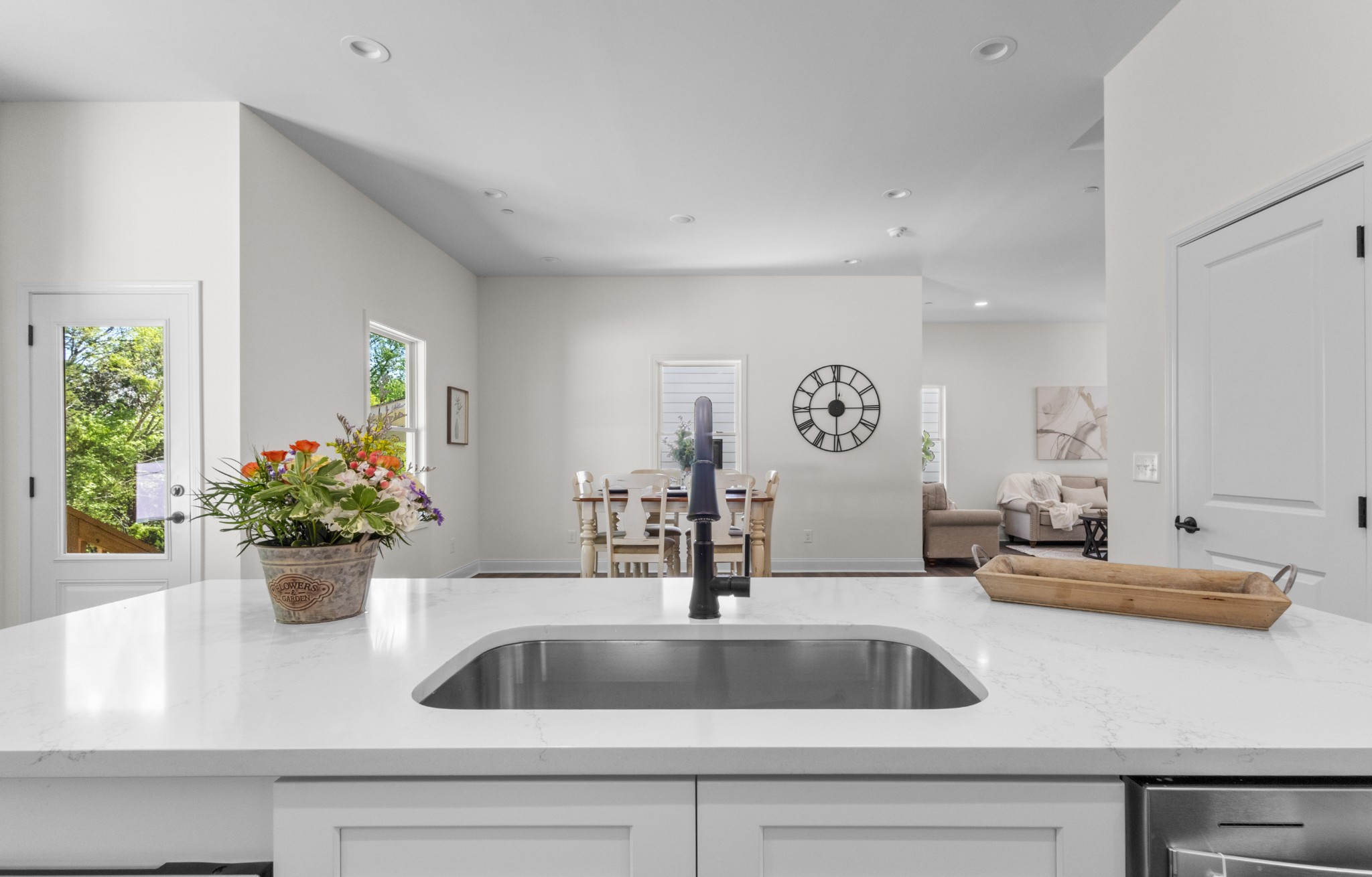 463 Centre Street Pleasant View, TN 37146 - Photo 10 of 43 a kitchen counter with sink and flowers
