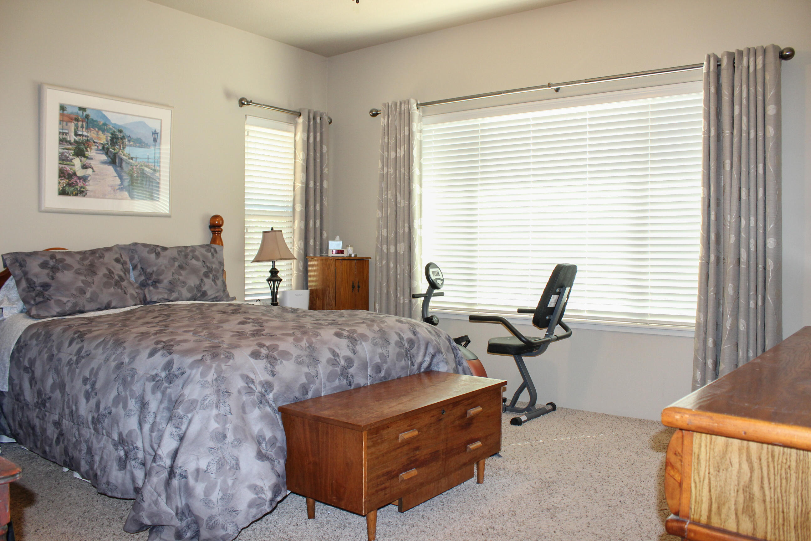 705 Three Pines Road Grants Pass, OR 97526 - Photo 37 of 47 a bedroom with furniture and windows