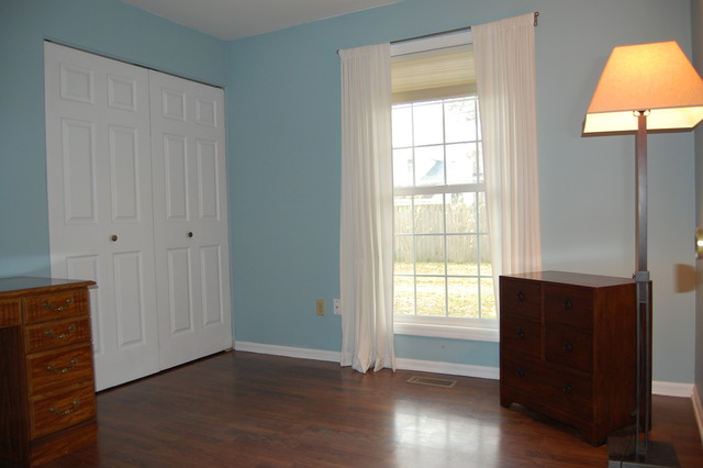 1072 Spring Garden Circle, Unit 4 Naperville, IL 60563 - Photo 5 of 18 an empty room with wooden floor and windows