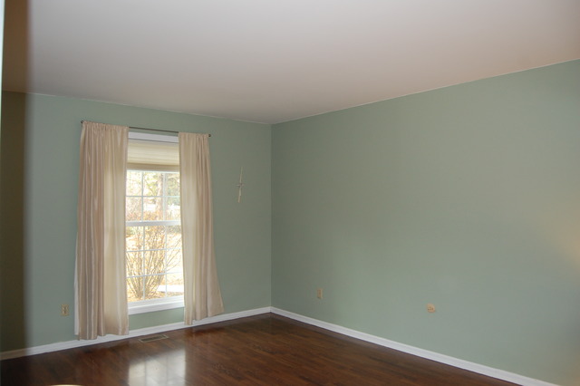 1072 Spring Garden Circle, Unit 4 Naperville, IL 60563 - Photo 6 of 18 a view of an empty room with wooden floor and a window