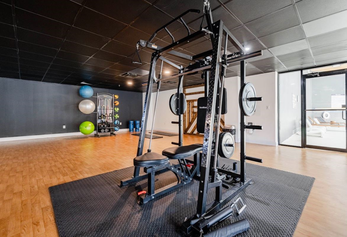 14703 Park Row Houston, TX 77079 - Photo 15 of 40 a view of a room with gym equipment