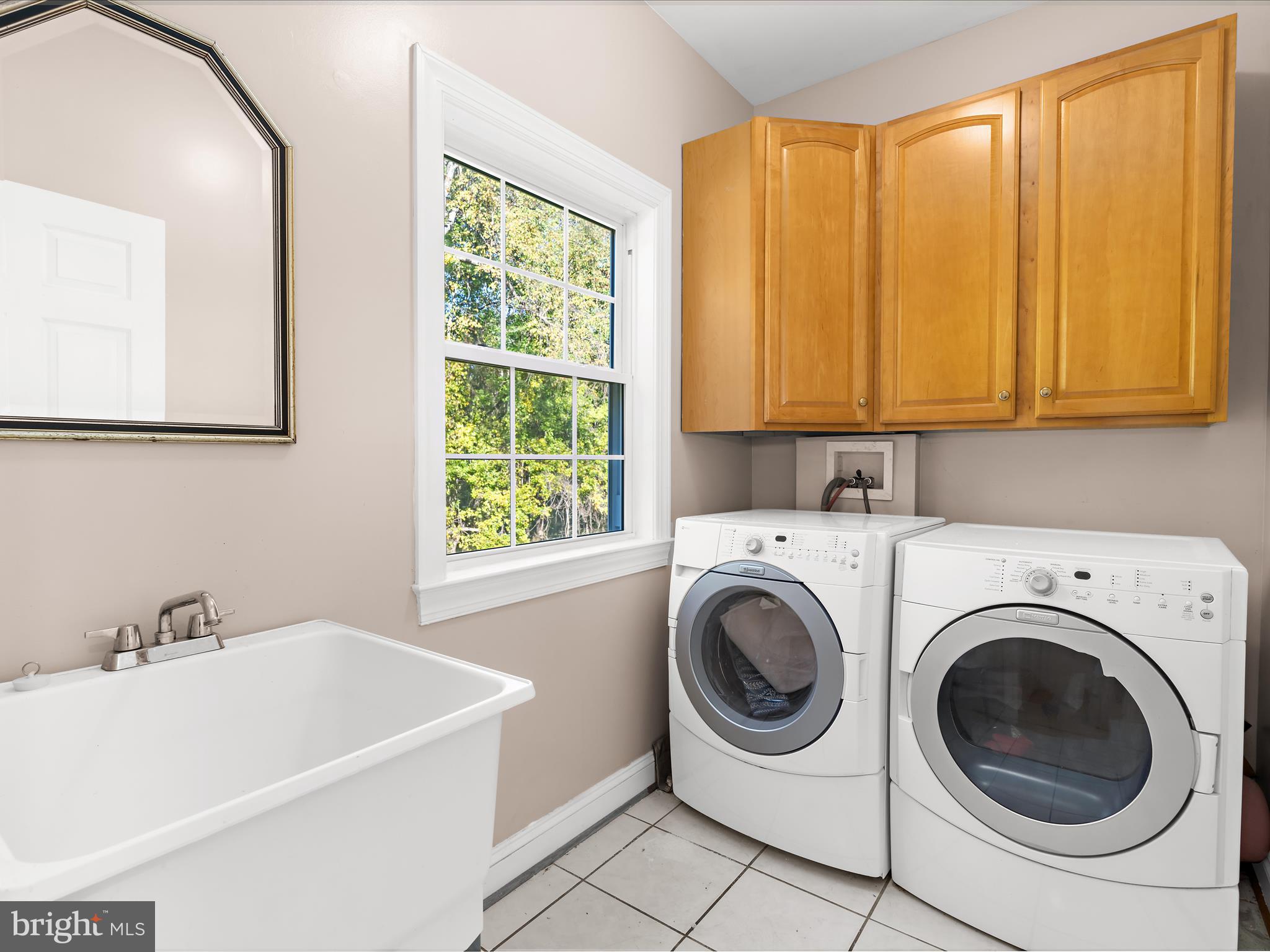 15533 Thompson Road Silver Spring, MD 20905 - Photo 12 of 76 a utility room with dryer and washer