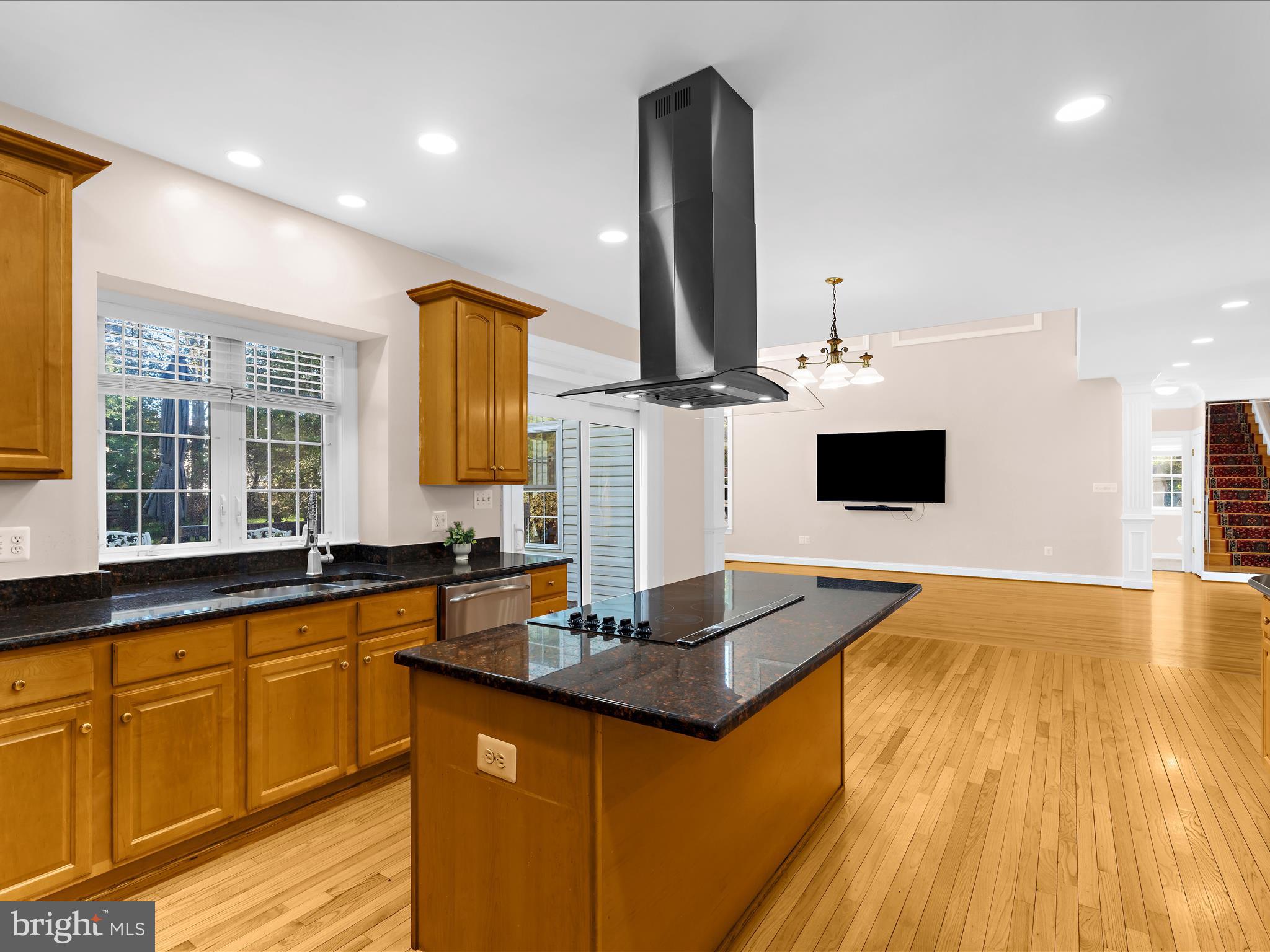 15533 Thompson Road Silver Spring, MD 20905 - Photo 13 of 76 a kitchen with sink and large mirror