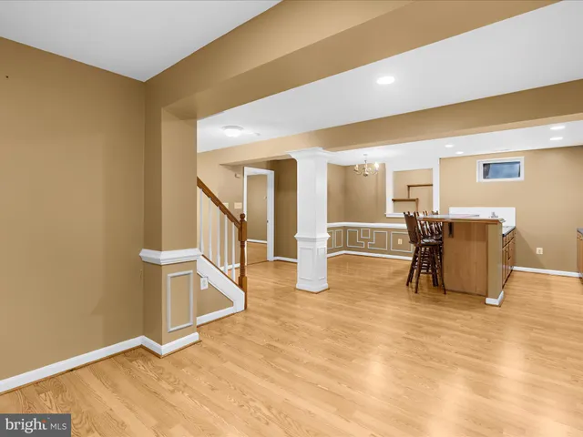 a view of an empty room with windows