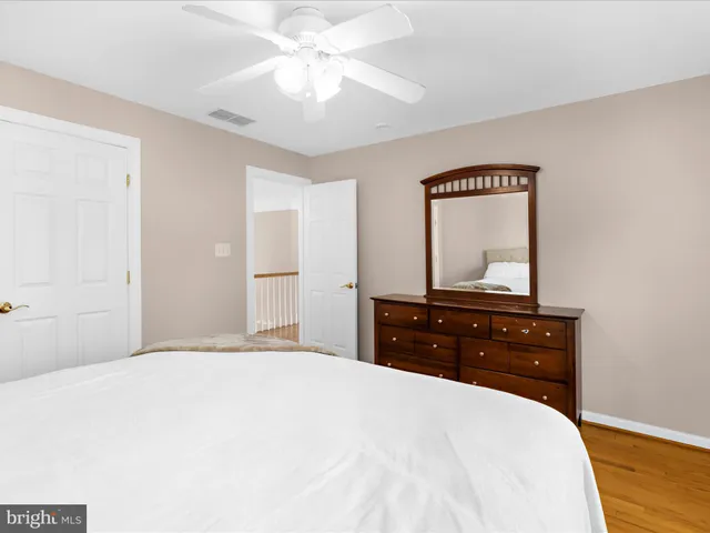 a bathroom with a tub sink and window