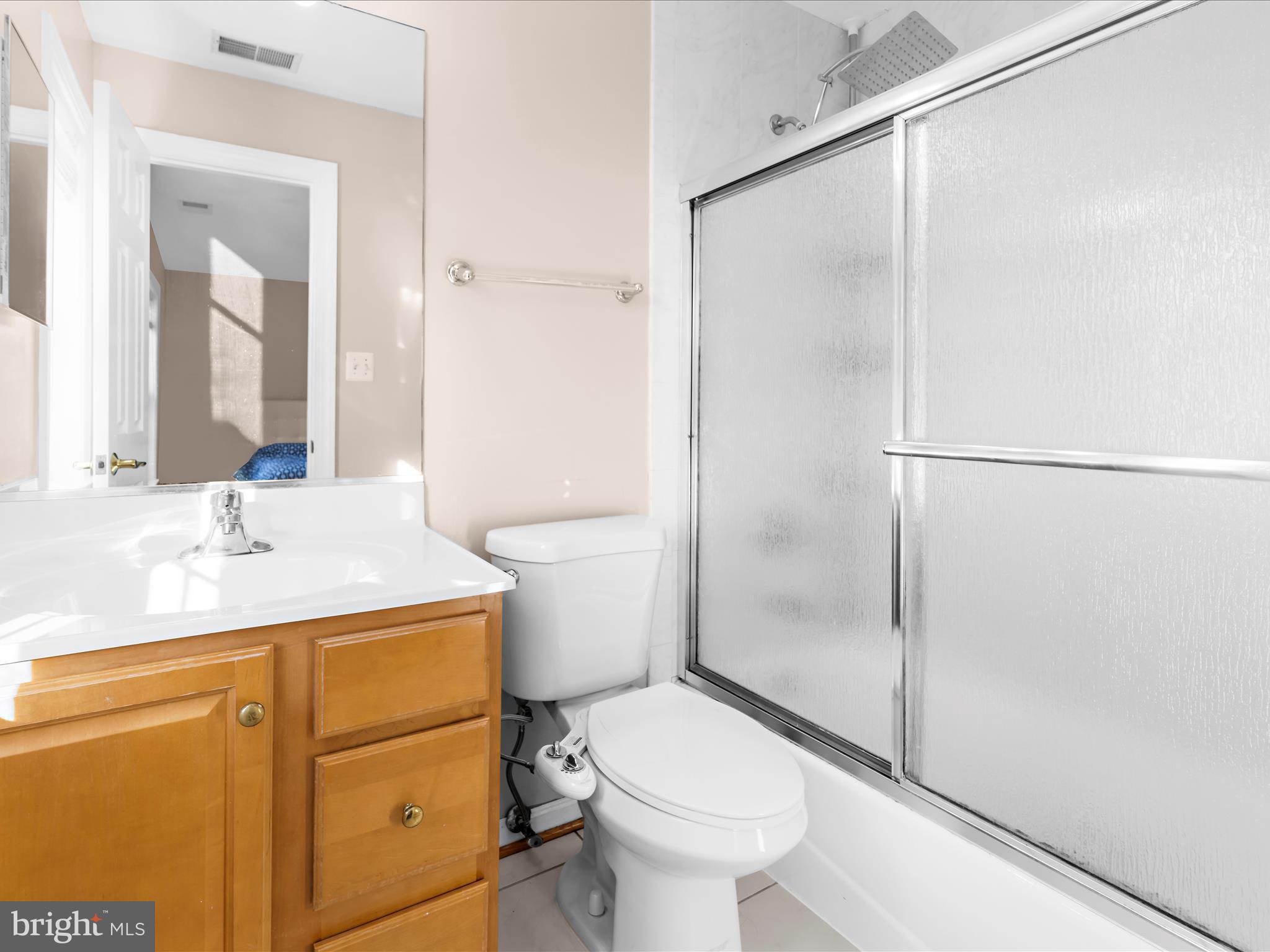 15533 Thompson Road Silver Spring, MD 20905 - Photo 37 of 76 a bathroom with a granite countertop sink toilet and shower
