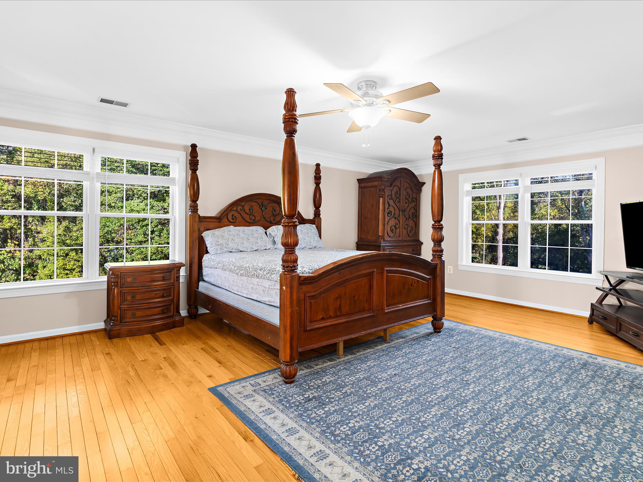 15533 Thompson Road Silver Spring, MD 20905 - Photo 38 of 76 a bedroom with a bed and large window with outer view
