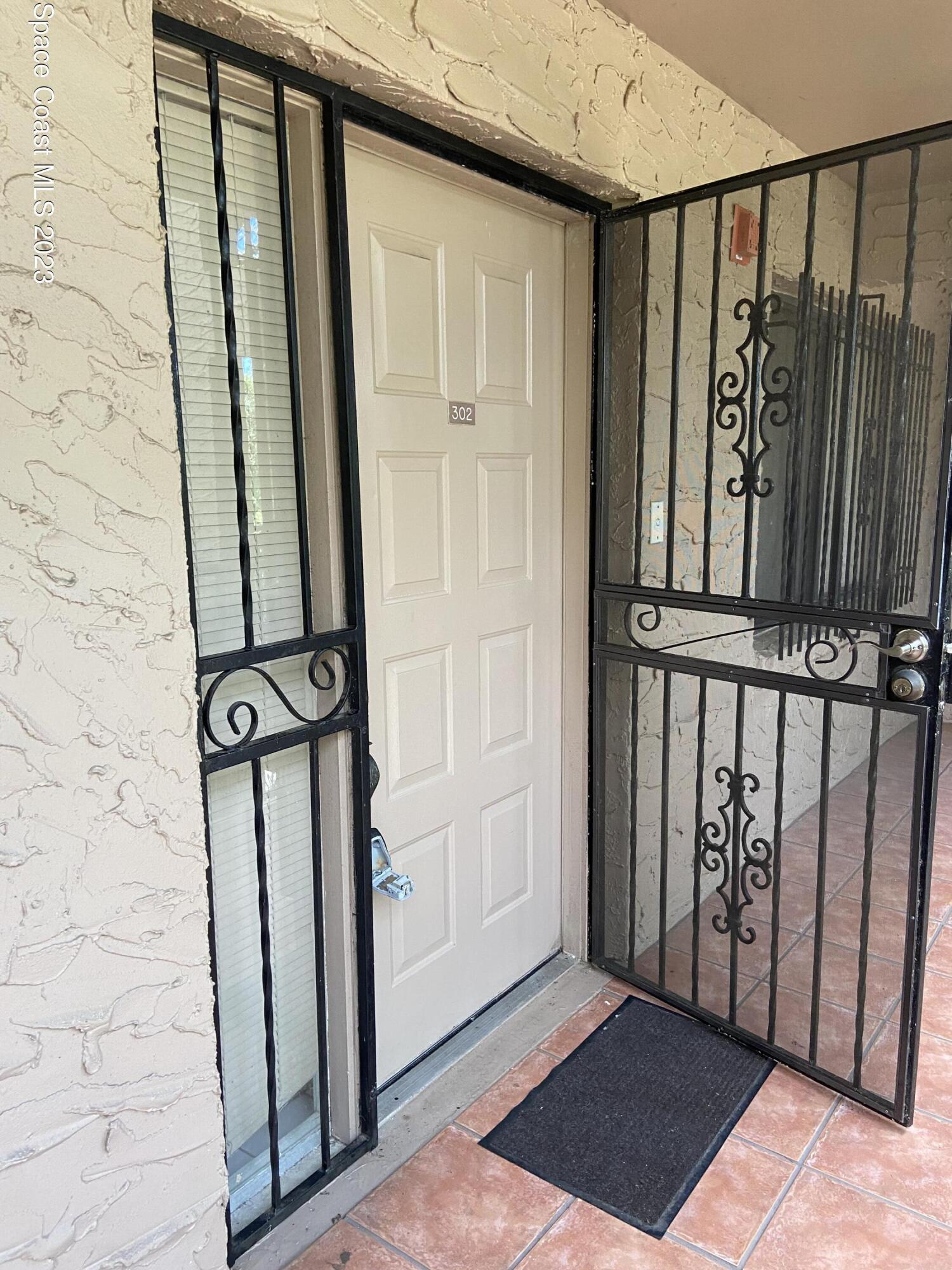 1540 Riverside Drive, Unit 8 Titusville, FL 32780 - Photo 2 of 22 Front Door