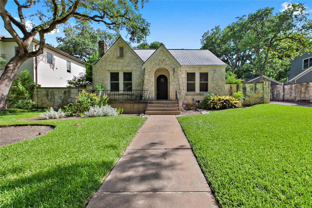 3000 Bonnie Road Austin, TX 78703 - Photo 1 of 1 a front view of a house with a yard and potted plants