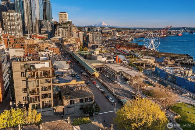 a view of city with tall buildings