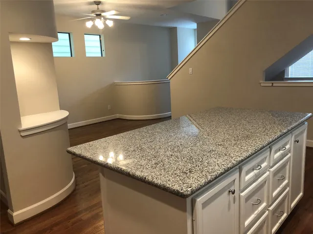 a kitchen with a sink and vanity
