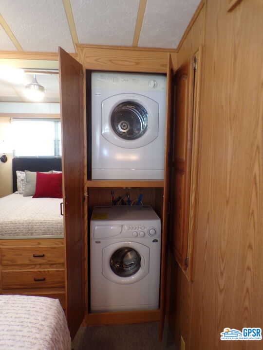 69801 Ramon Road, Unit 246 Cathedral City, CA 92234 - Photo 13 of 44 a utility room with dryer and washer