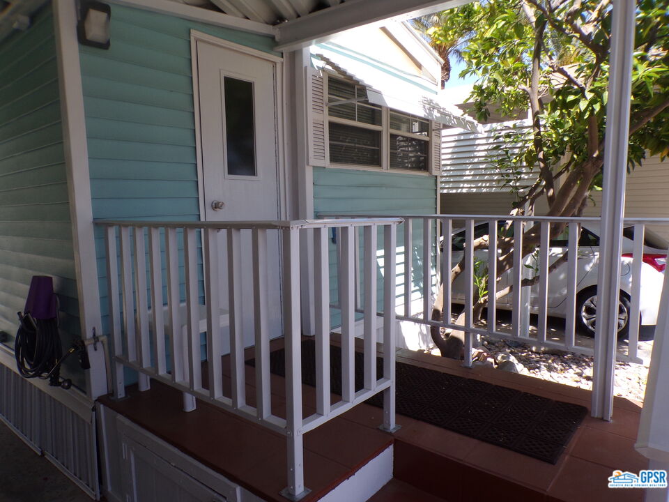 69801 Ramon Road, Unit 246 Cathedral City, CA 92234 - Photo 21 of 44 a view of a balcony with chairs