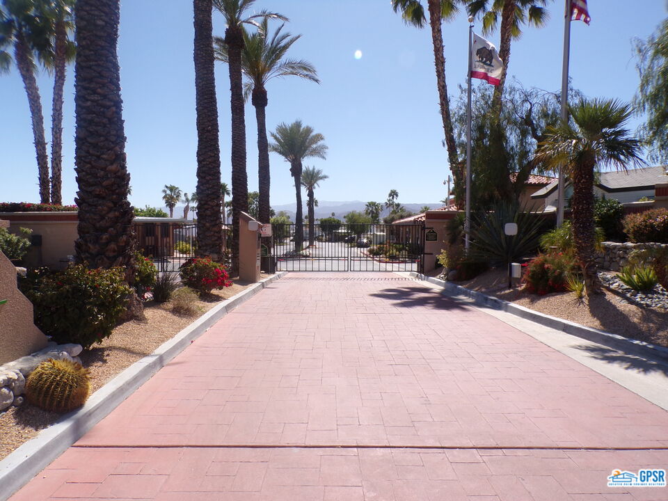 69801 Ramon Road, Unit 246 Cathedral City, CA 92234 - Photo 37 of 44 a view of a backyard with a fountain