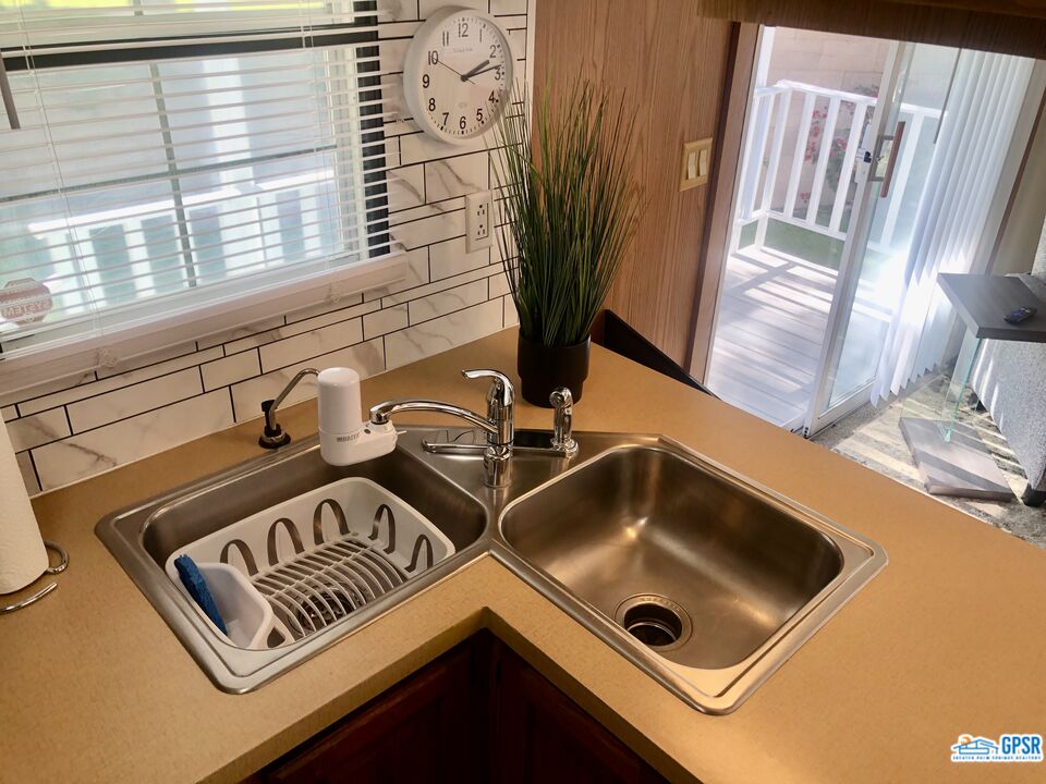 69801 Ramon Road, Unit 246 Cathedral City, CA 92234 - Photo 7 of 44 a close view of sink and tap
