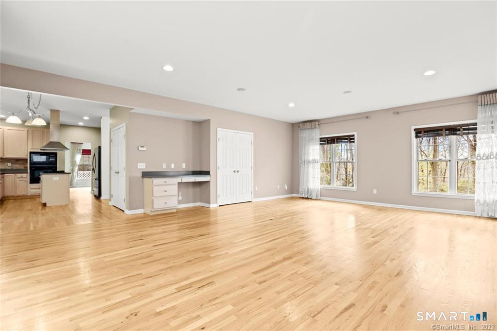 22 Apollo Road Bethel, CT 06801 - Photo 9 of 25 Living room view to kitchen