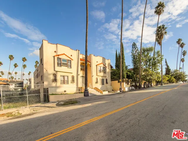 a view of a building with a street
