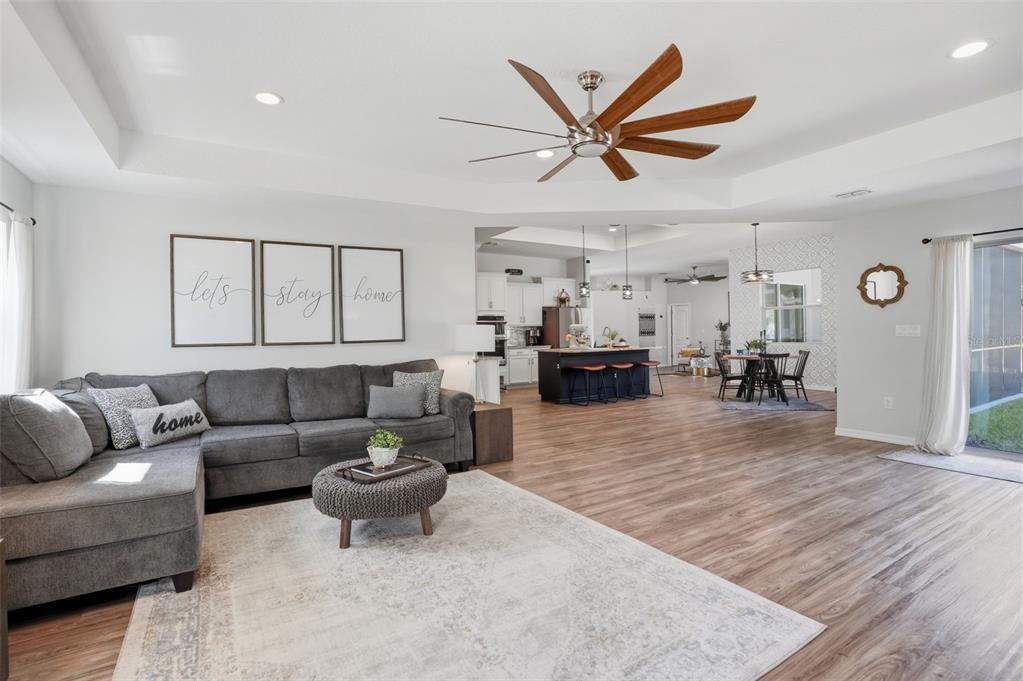 18166 Ramsey Road Weeki Wachee, FL 34614 - Photo 17 of 57 a living room with furniture a view of bedroom and a window