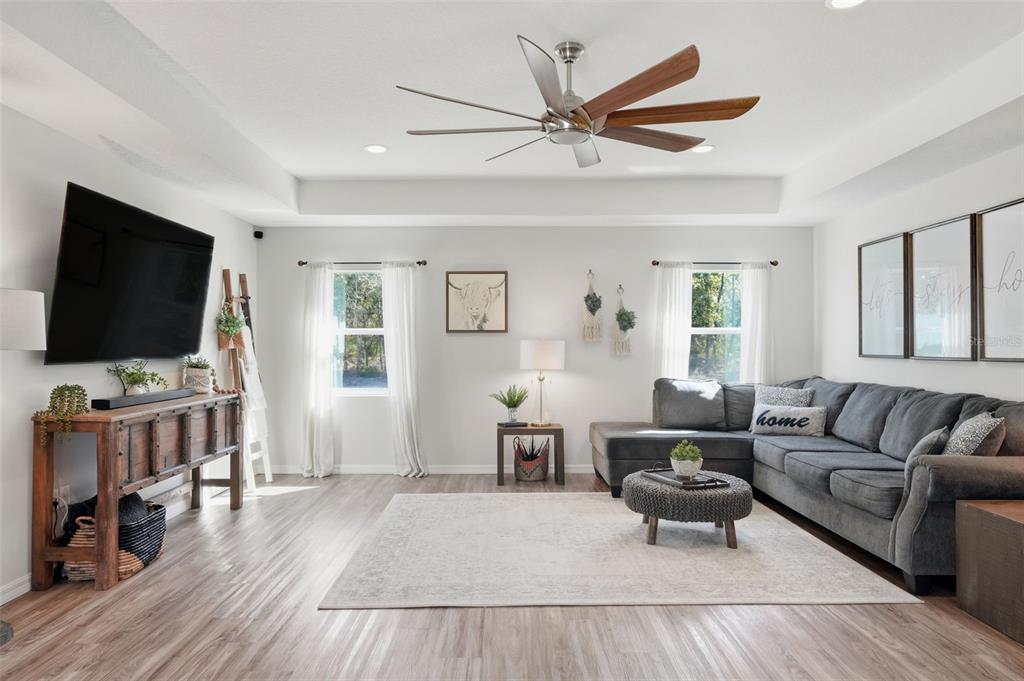 18166 Ramsey Road Weeki Wachee, FL 34614 - Photo 20 of 57 a living room with furniture and a flat screen tv