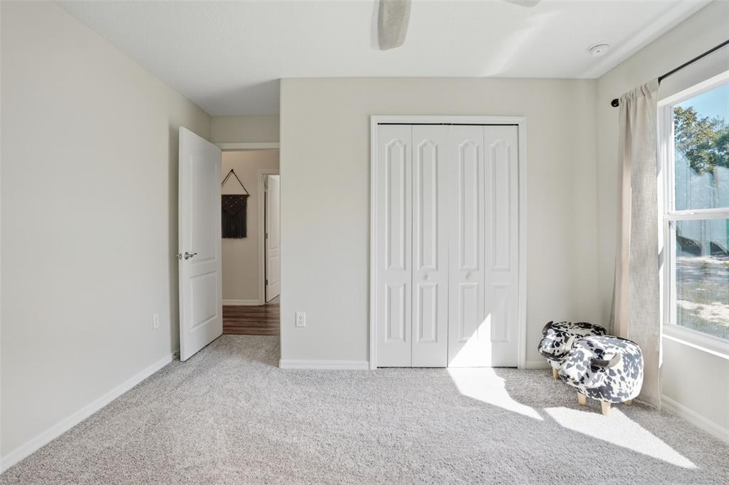 18166 Ramsey Road Weeki Wachee, FL 34614 - Photo 34 of 57 a view of a livingroom with an empty space and a window