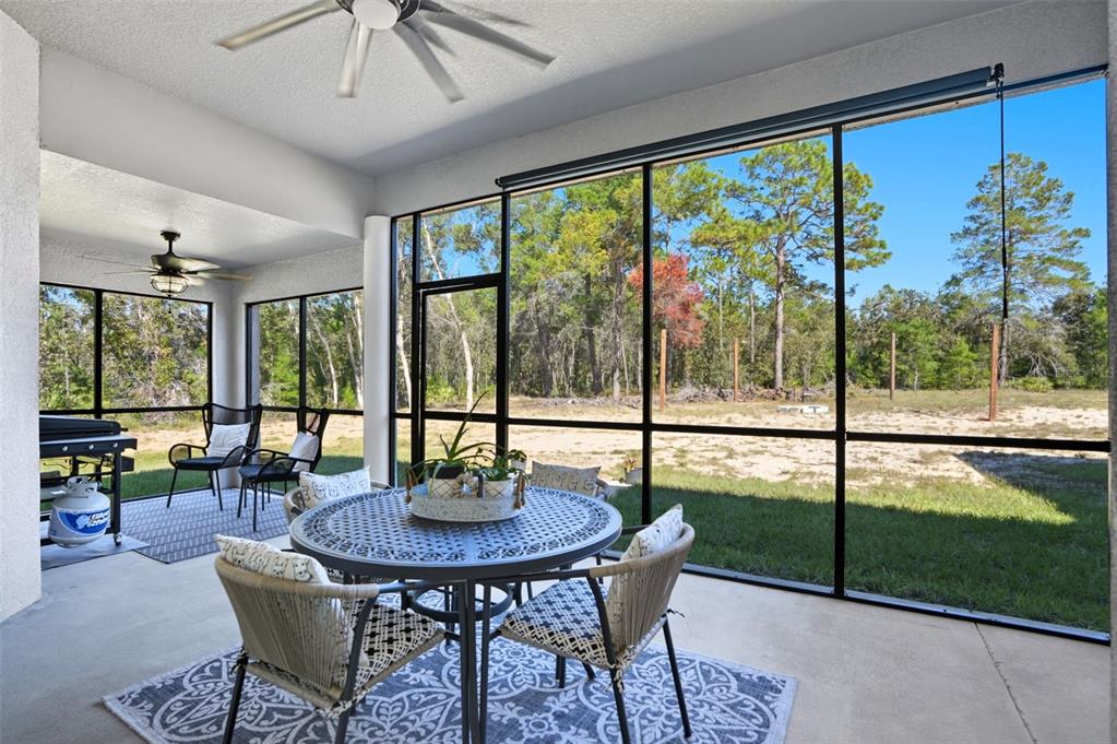 18166 Ramsey Road Weeki Wachee, FL 34614 - Photo 40 of 57 a view of a dining room with furniture window and outside view