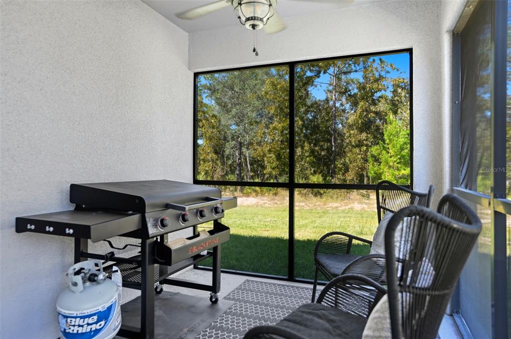 18166 Ramsey Road Weeki Wachee, FL 34614 - Photo 42 of 57 a view of a workspace with furniture and a window