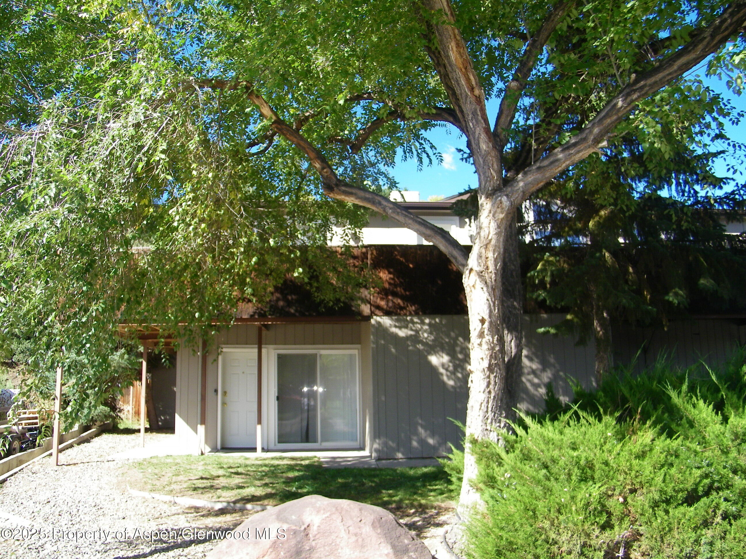 531 Park Avenue Rifle, CO 81650 - Photo 1 of 27 front view of a house with a yard