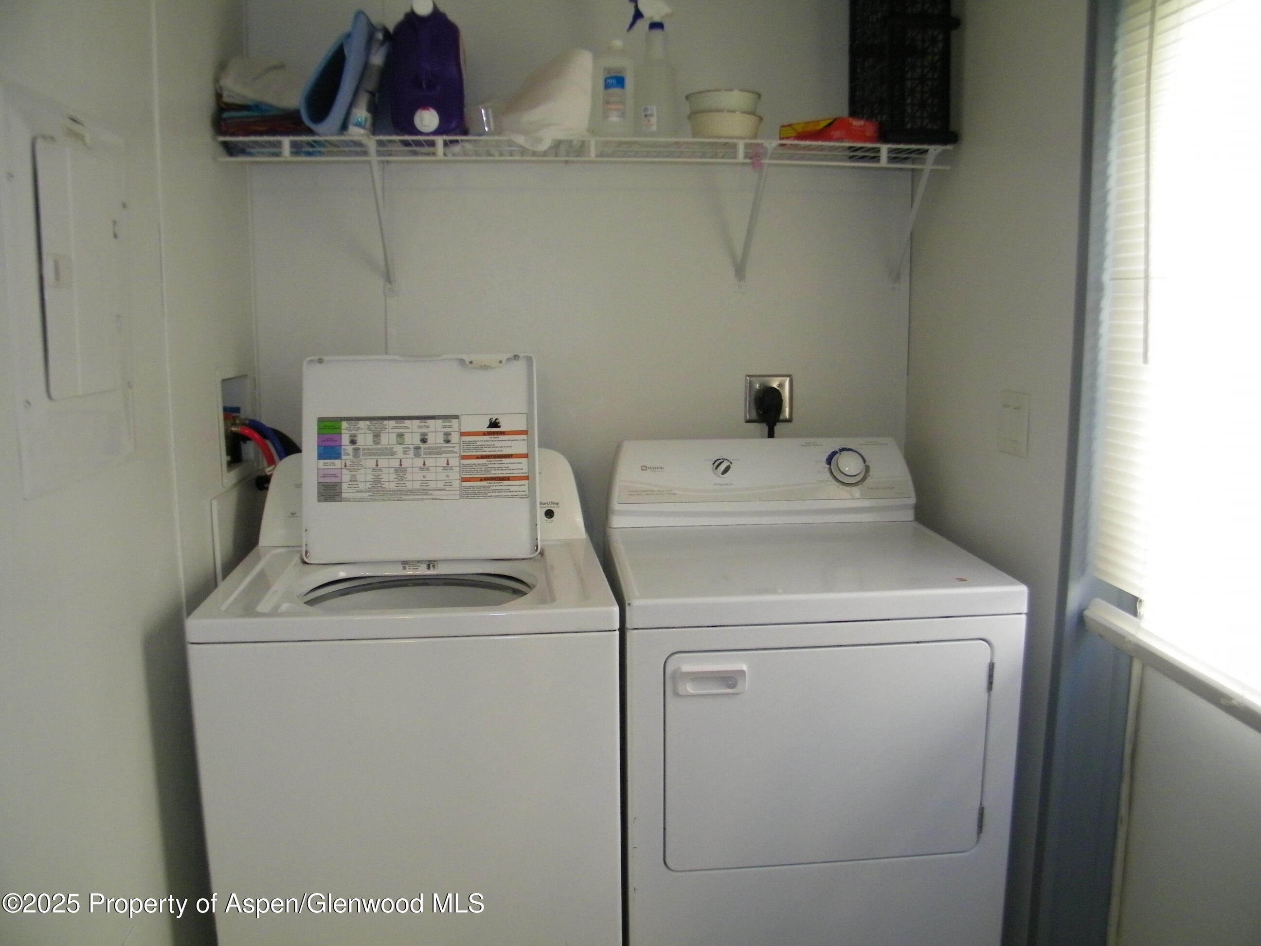 531 Park Avenue Rifle, CO 81650 - Photo 11 of 27 a utility room with dryer and washer