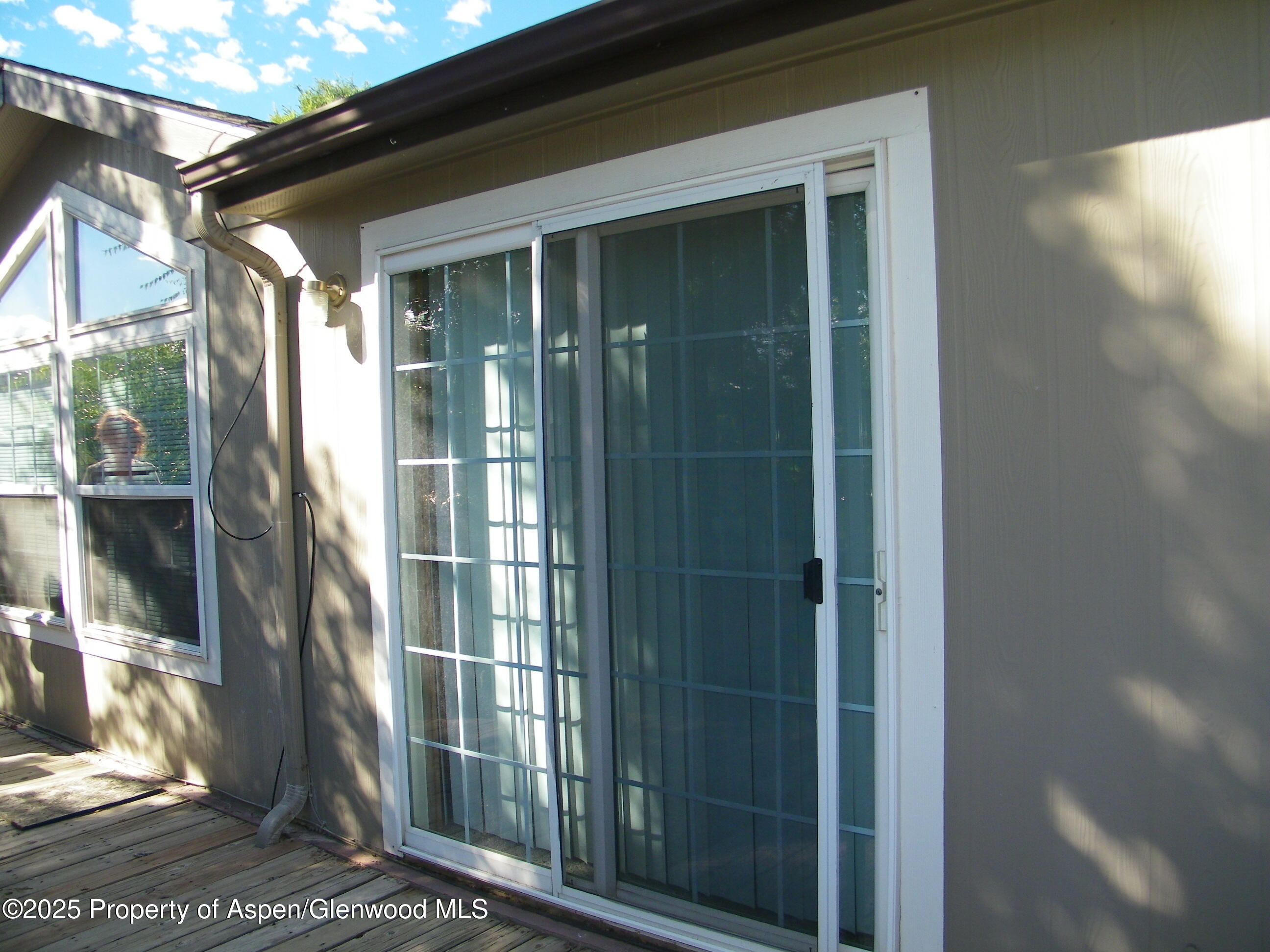 531 Park Avenue Rifle, CO 81650 - Photo 21 of 27 a view of a glass door of the house