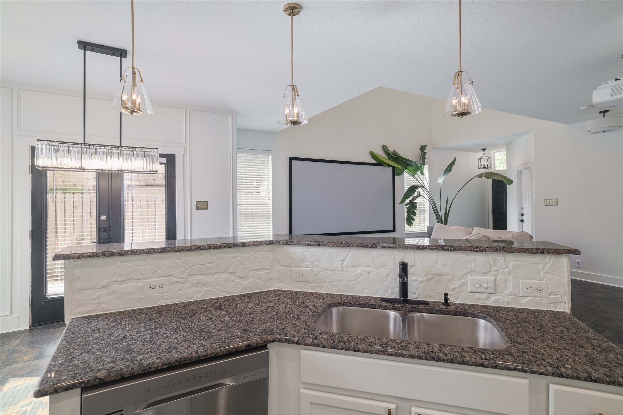 2101 Rivers Edge Way, Unit 26 Austin, TX 78741 - Photo 12 of 29 Island overlooks living space.