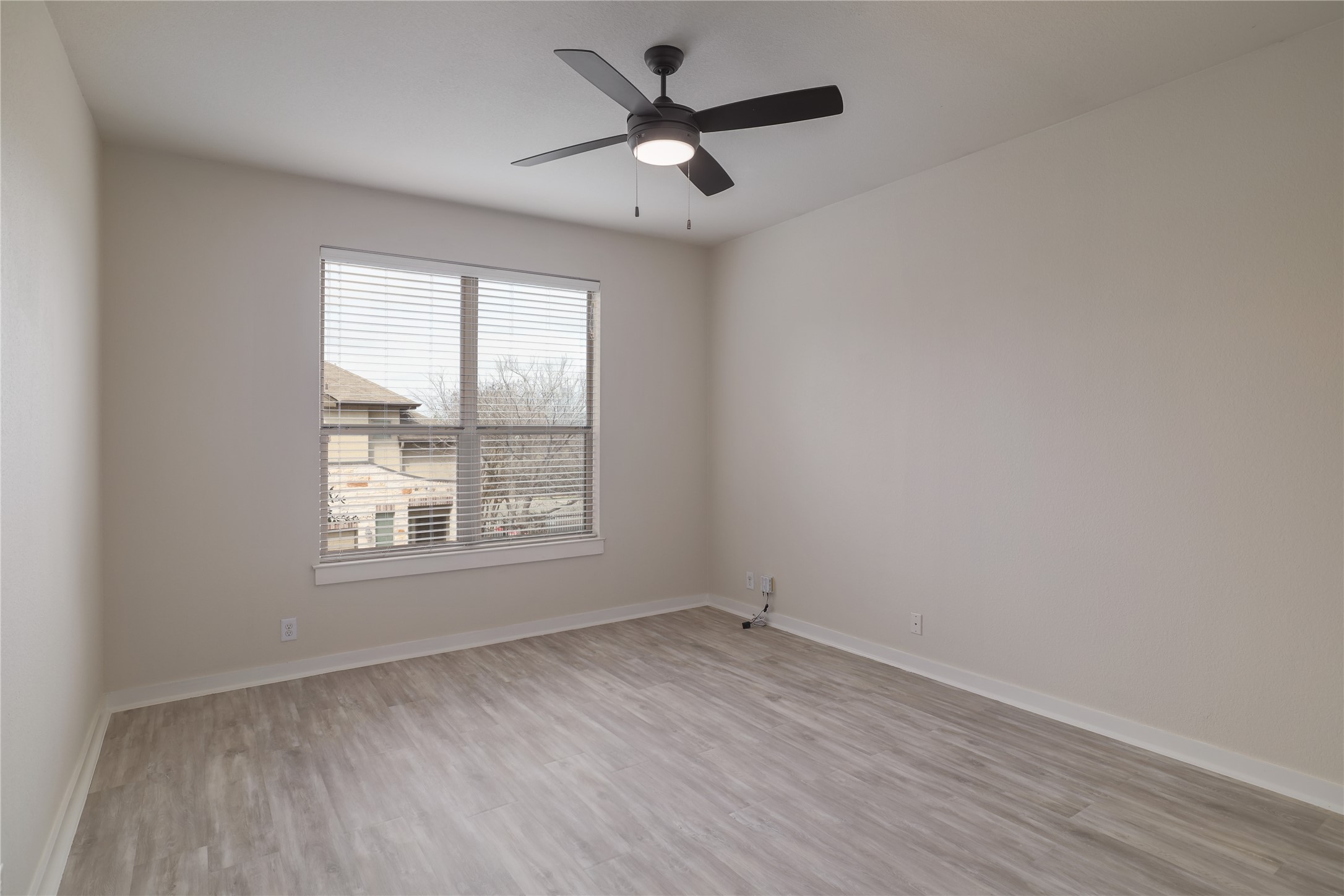 2101 Rivers Edge Way, Unit 26 Austin, TX 78741 - Photo 16 of 29 Primary bedroom.