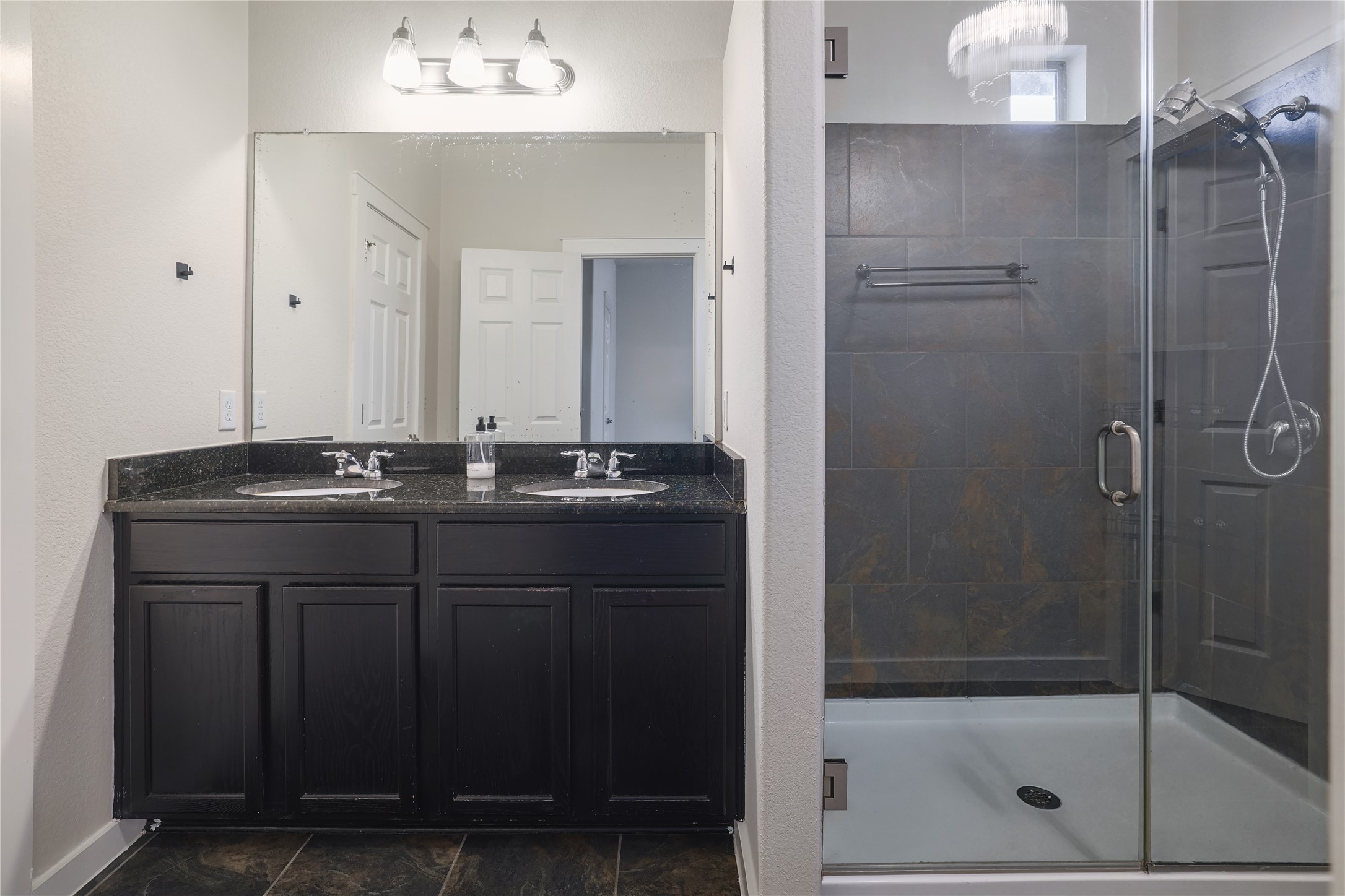 2101 Rivers Edge Way, Unit 26 Austin, TX 78741 - Photo 19 of 29 Primary bathroom.