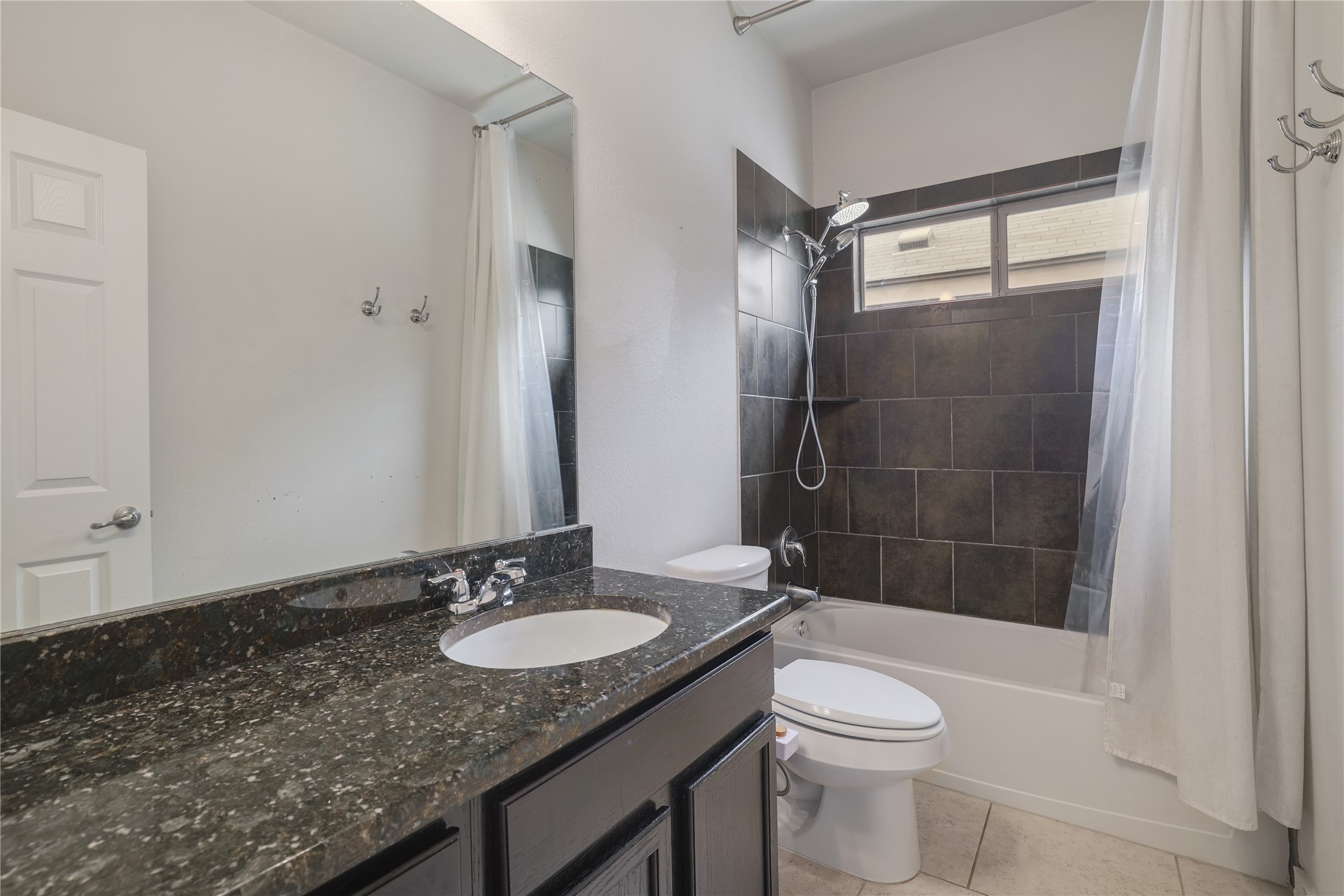 2101 Rivers Edge Way, Unit 26 Austin, TX 78741 - Photo 23 of 29 Guest bathroom.