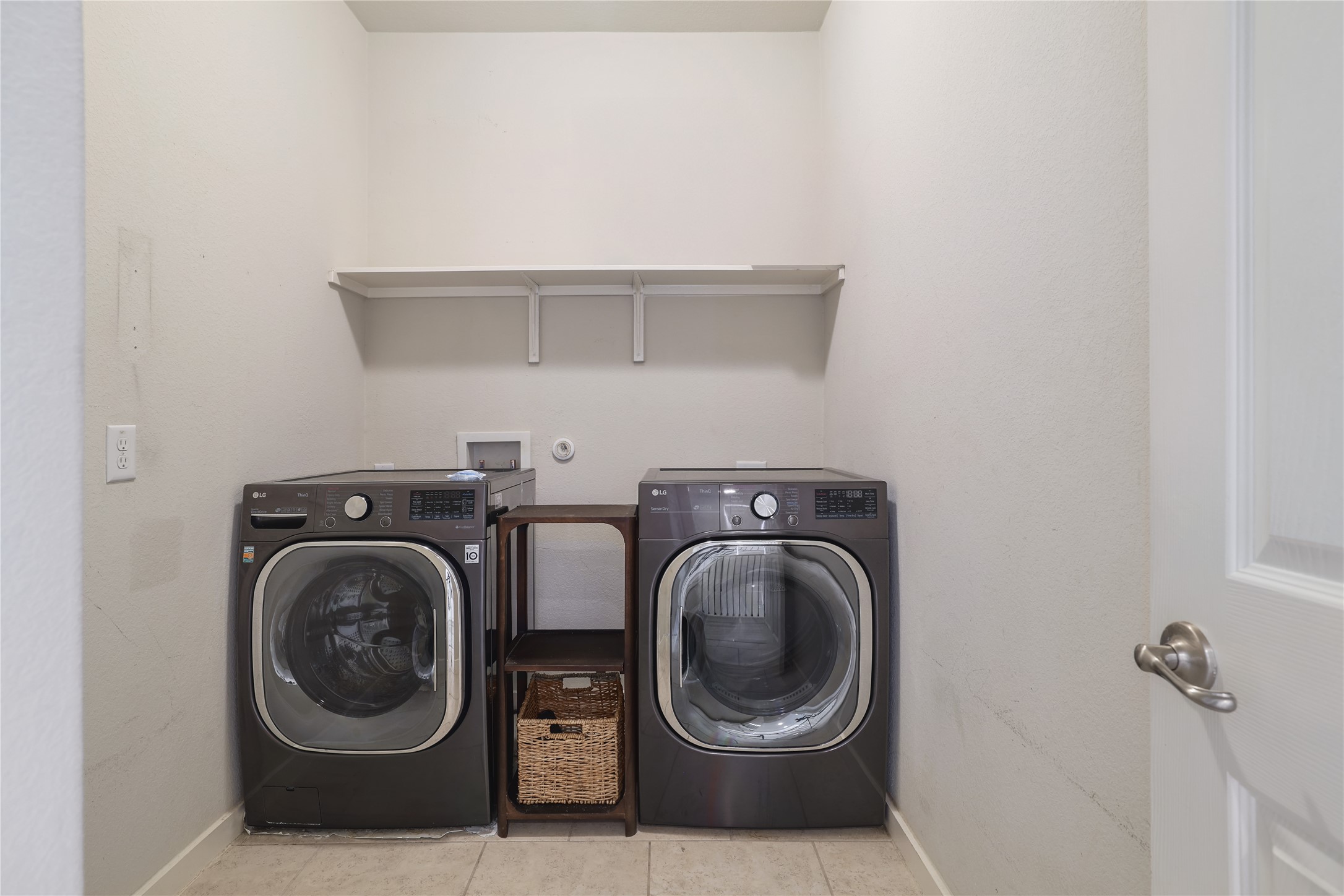 2101 Rivers Edge Way, Unit 26 Austin, TX 78741 - Photo 24 of 29 Upstairs laundry room.