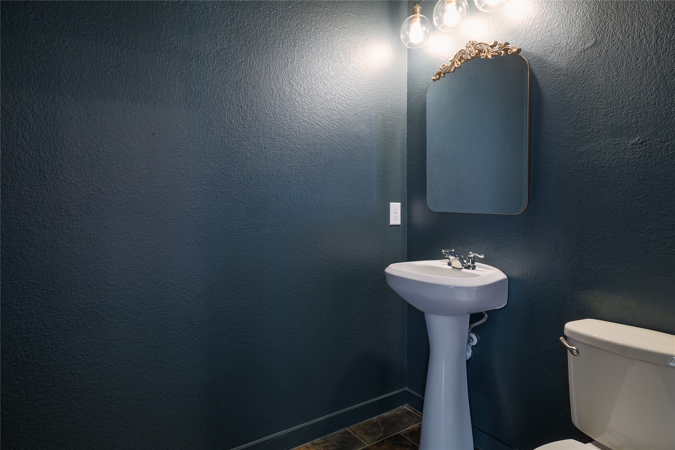 2101 Rivers Edge Way, Unit 26 Austin, TX 78741 - Photo 25 of 29 Downstairs half bathroom.