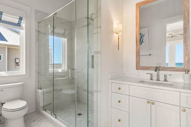 a bathroom with a sink and a window