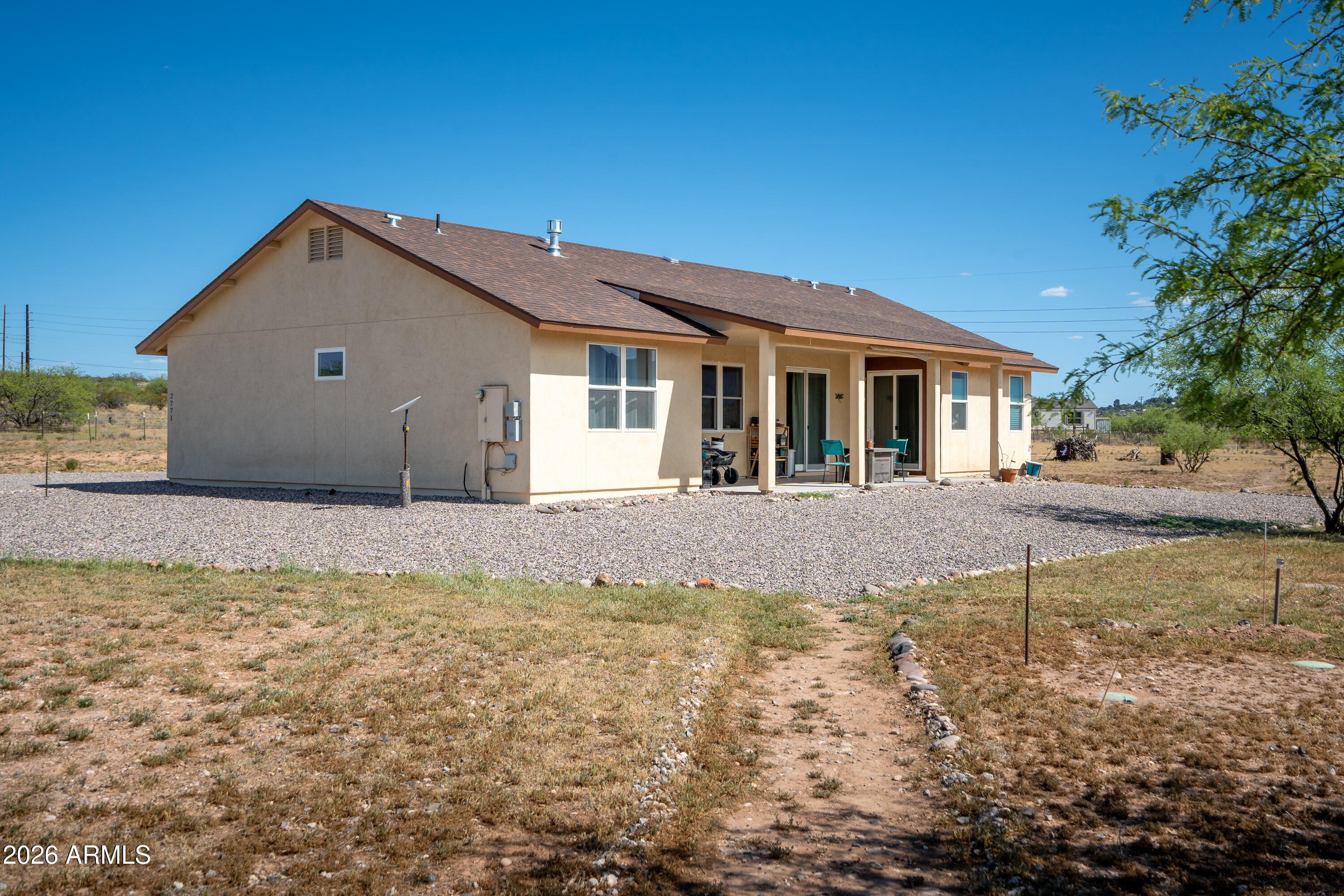2771 South Country Hill Road Cornville, AZ 86325 - Photo 14 of 48 a view of a house with a yard