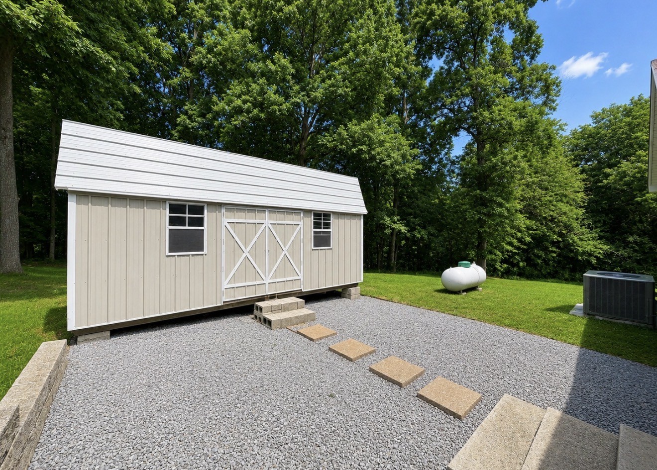 153 Henry Harris Road Westmoreland, TN 37186 - Photo 16 of 18 a front view of a house with garden